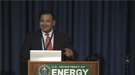 Amit Goyal at the DOE podium delivering a presentation for the Science Lecture Series.