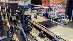 The Large Area Picosecond Photodetector (LAPPD) collaboration has developed cheaper, larger, more robust microchannel plates, seen here at a test facility at Argonne.