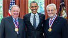 President Barack Obama greets 2014 Enrico Fermi Award recipients Charles Shank, left, and Claudio Pellegrini in the Oval Office, Oct. 20, 2015.