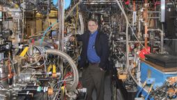 Mark Palmer, director of the Accelerator Test Facility, with equipment at the facility.