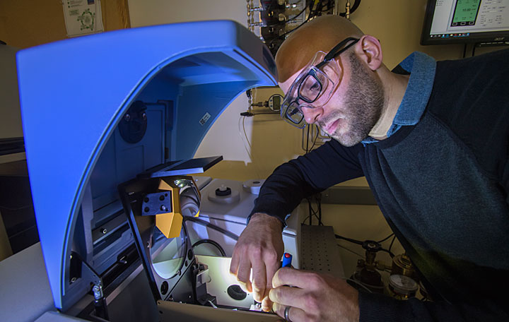 Clifford Gerlak, an intern in the chemistry division, is researching fundamental reactions of methane (CH4) and carbon dioxide (CO2) and the behavior of catalysts that can produce useful chemicals.