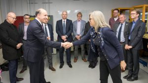 DOE Undersecretary for Science Paul Dabbar is greeted by Caltech scientist Maria Spiropulu, who leads the Fermiab Quantum NETwork. Photo: Reidar Hahn