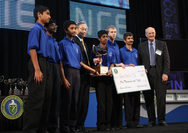 The Middle School 2011 Science Bowl&reg; winners stand on stage with Secretary Chu and Dr. Brinkman