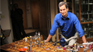 David Pogue standing at Theodore Gray's Periodic Table