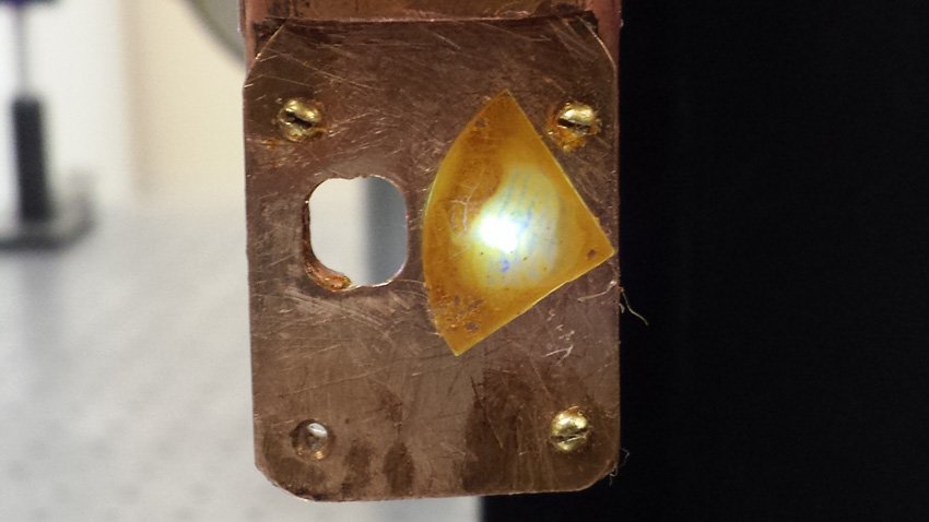 The visible light emission from a polymer film containing platinum atoms has been tuned by adjusting the spacing of the platinum atoms in the polymer chain.